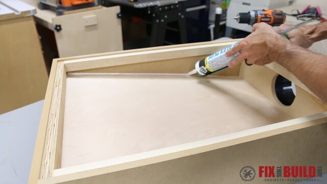 caulking the seams of dust chute downdraft table