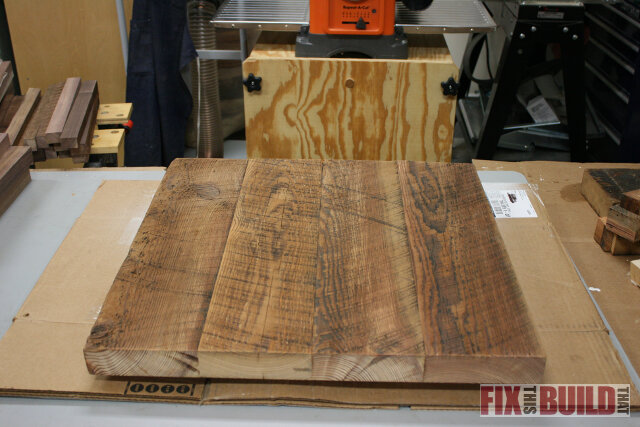 sanding reclaimed wood