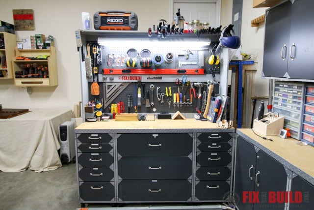 woodshop pegboard storage and cabinets