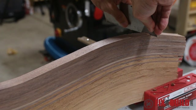 card scraper flattening a cutting board