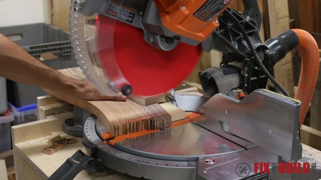 cutting a cutting board to length on a miter saw