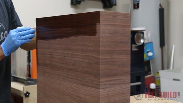 applying finish to a modern end table