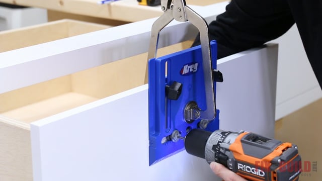 Drilling holes for cabinet pulls with a Kreg Cabinet Hardware Jig