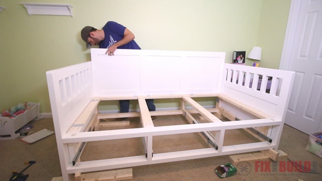 DIY kids bed with storage drawers underneath