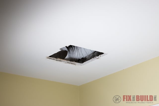 enlarging a hole for a bathroom exhaust fan