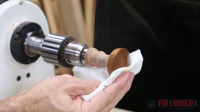 applying woodturners finish on lathe