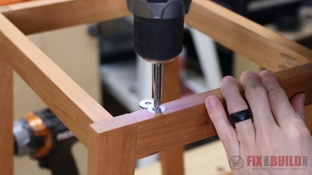 attaching a top with figure eight fasteners