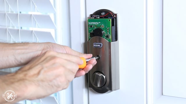 attaching inside of keyless deadbolt to front door