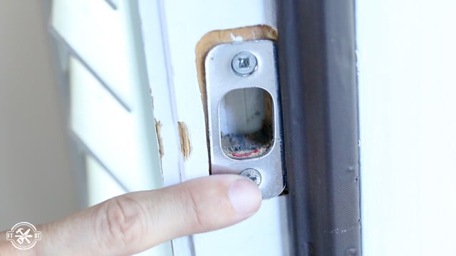 red lipstick on door lock