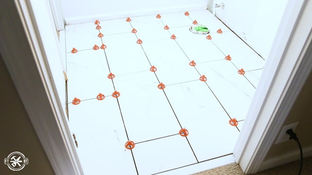 tile floor with spacers throughout