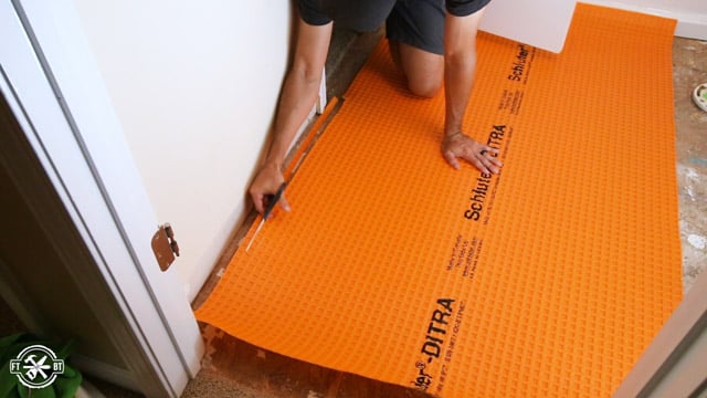fitting the ditra underlayment in the bathroom