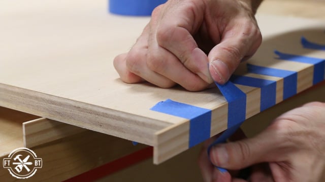 attaching banding to the edge of the plywood