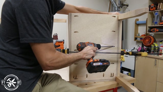 attaching the sides of desk to the stretchers