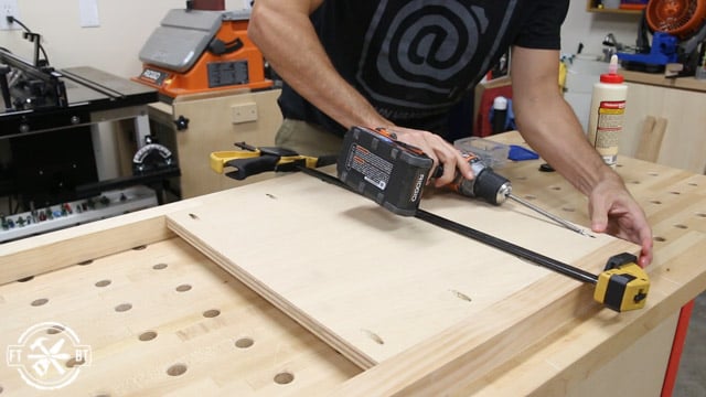 screwing in side panels on desk