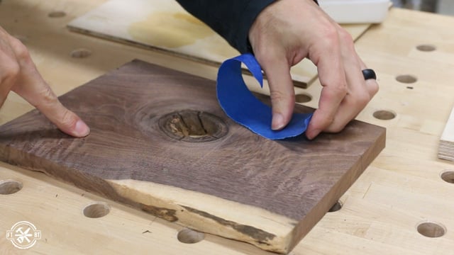 taping the back of a knot to fill with epoxy