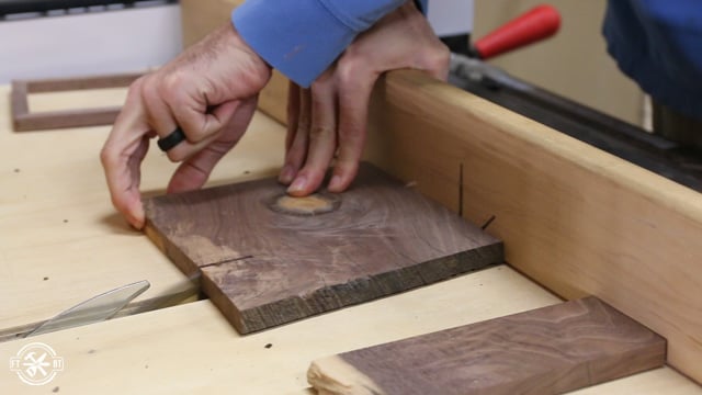 cutting a board down to size with table saw