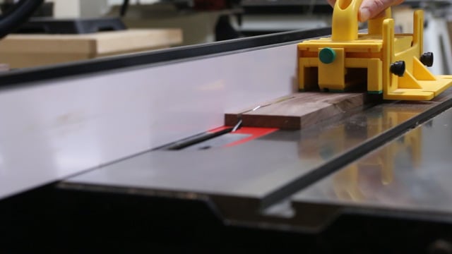 piece of wood on table saw