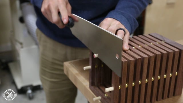 cutting off the end of the dowel rods