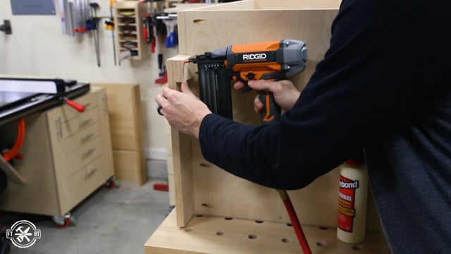 adding block of wood to bottom of cabinet for adjustable feet