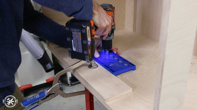 drilling holes for adjustable shelf in wooden cabinet