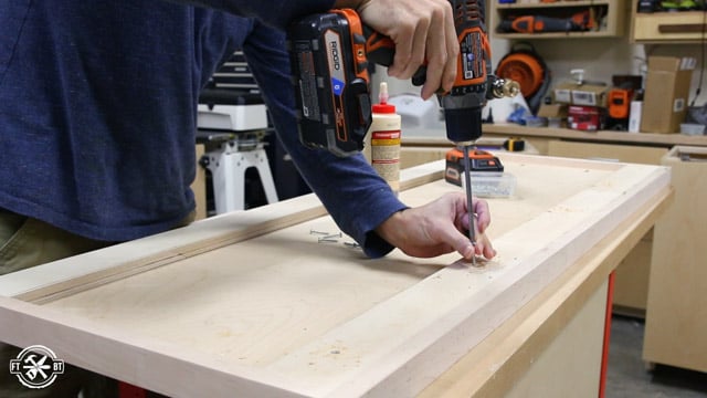 adding extra wood under the cabinet top for stability