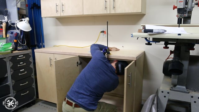 attaching the top of the cabinet to the base