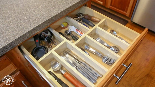 diy drawer organizer in wooden drawer with utensils