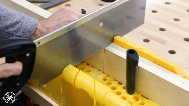 cutting wood with a miter box