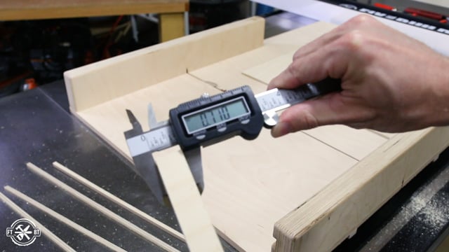 adjusting table saw sled with calipers