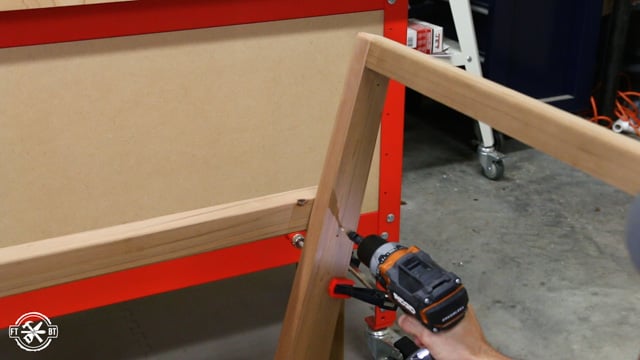 pre-drilling the chair back into the arm of chair