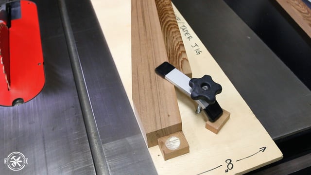 using tapering jig and table saw to cut wood