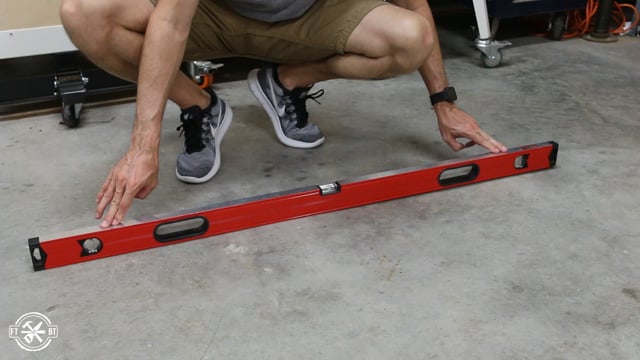 Checking floor to find level spot for building