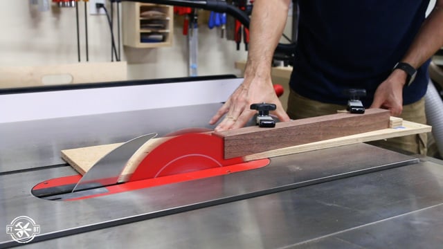 making cuts on table saw using tapering jig