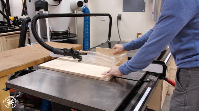 cutting wood pieces on the table saw
