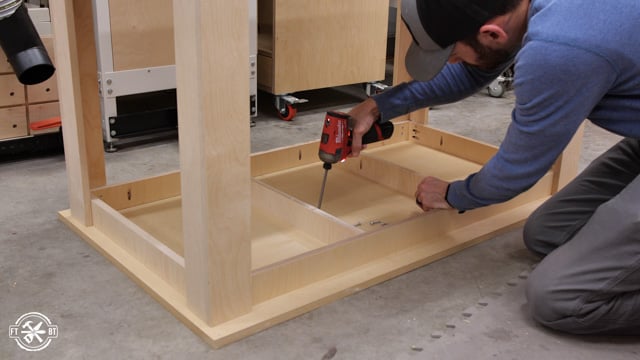 screwing table frame to work surface