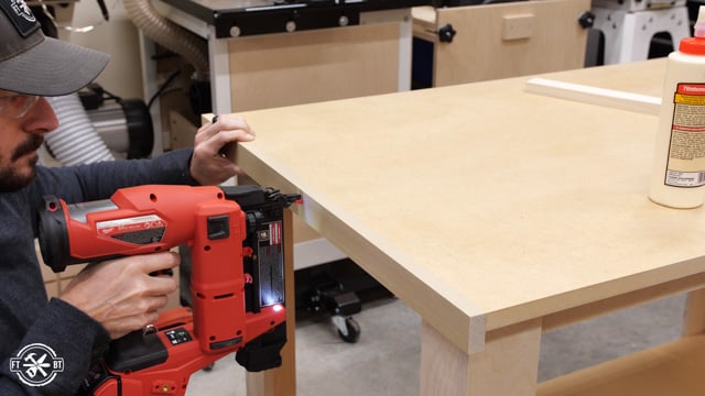 attaching trim to work surface