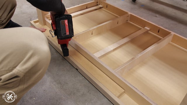 adding plywood pieces under edge of table