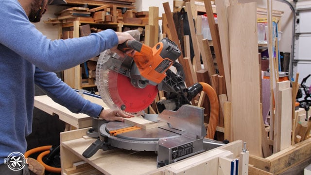 cutting wood on miter saw