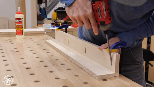 screwing wood together to make table leg