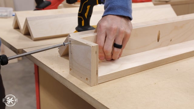 screwing square blocks to table legs