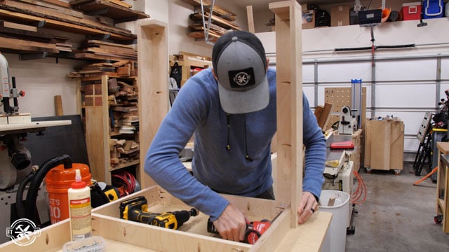screwing legs to base of outfeed table