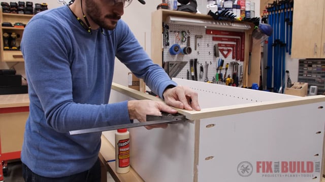 using combination square to add trim to hutch