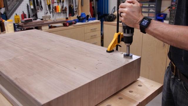 Adding holes for wire management to desk