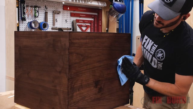 adding finish to cabinet