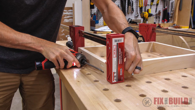screwing together pull out tray