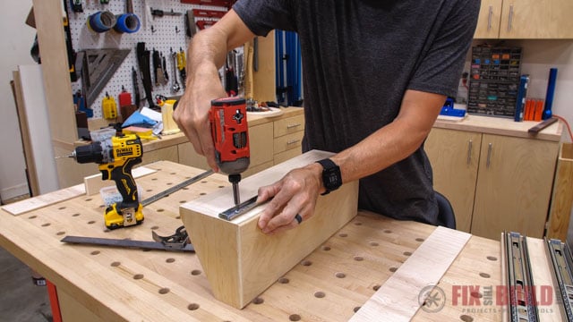 attaching drawer slide to side of drawer slide