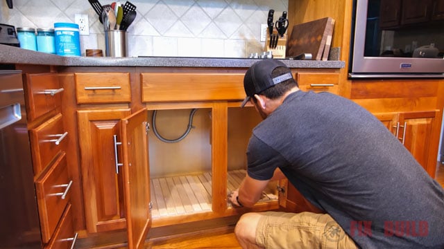 attaching base in cabinet