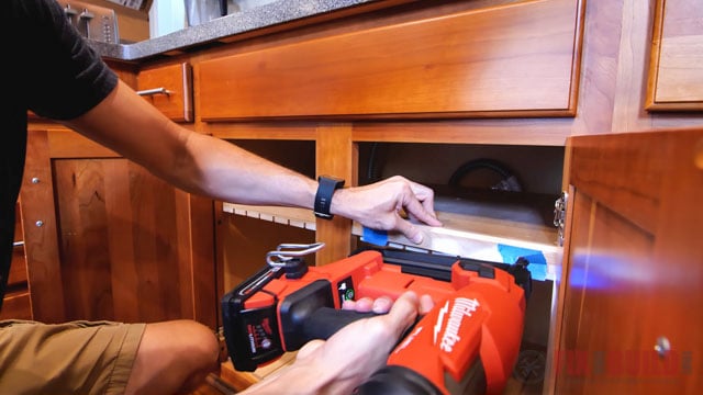 adding trim to diy cutting board storage