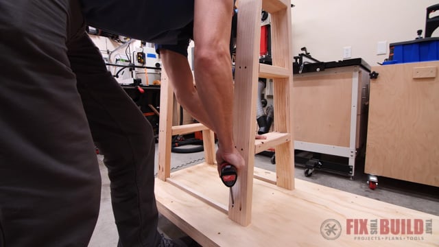 screwing A frames to base of lumber cart