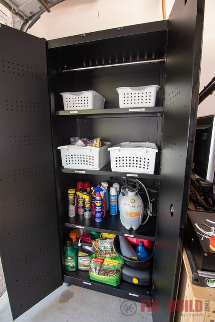 husky garage cabinet holding bins and containers